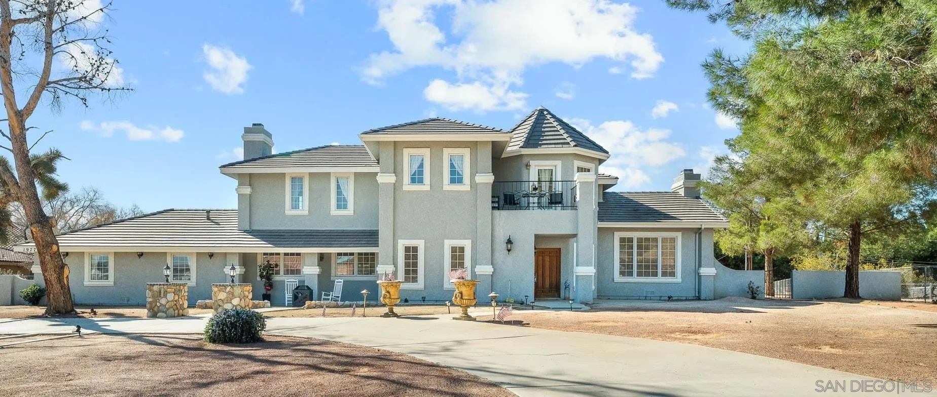 19775 Symeron Road Apple Valley, CA 92307 - Photo 6 of 73 a front view of a building with street view