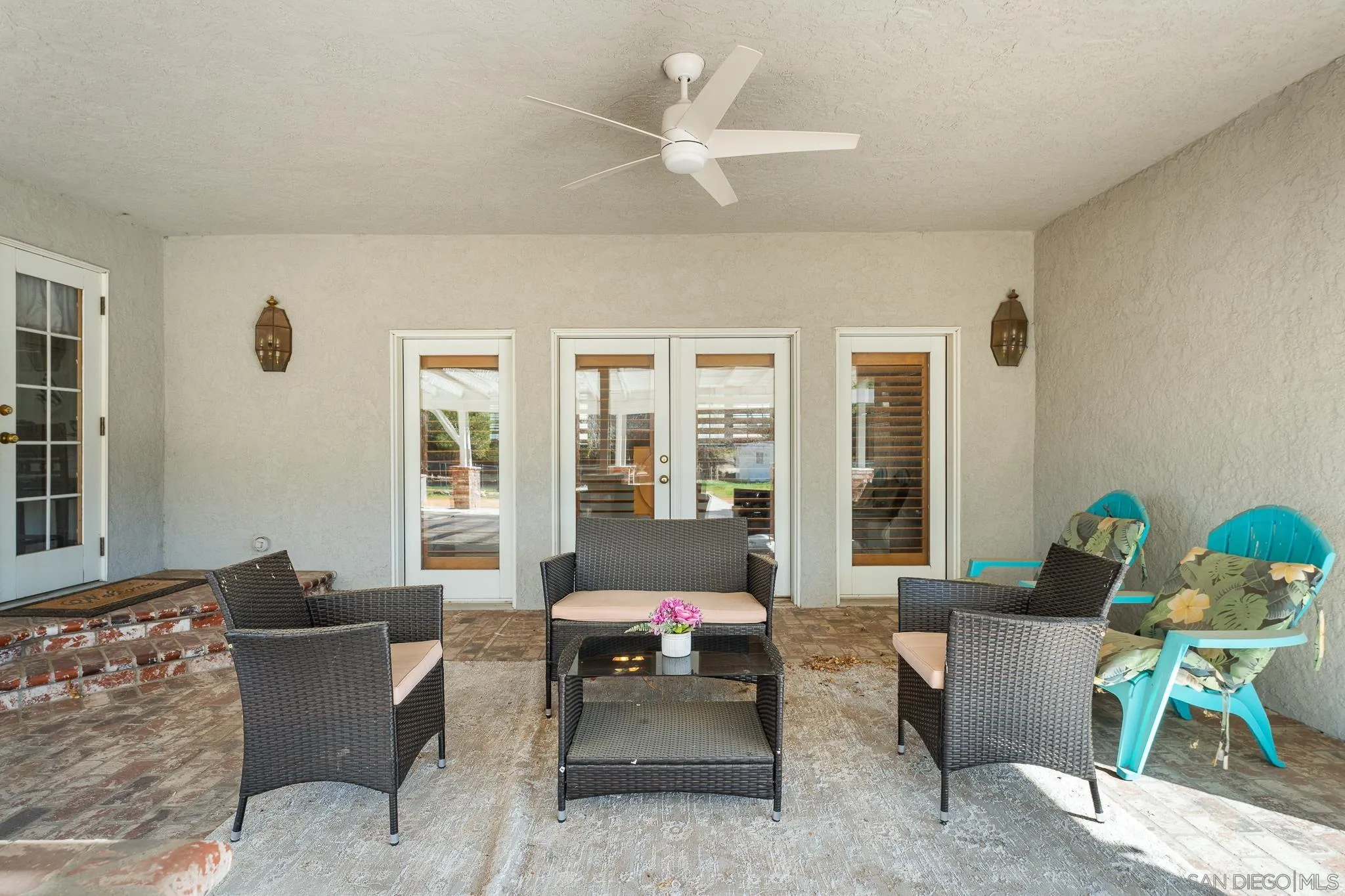 19775 Symeron Road Apple Valley, CA 92307 - Photo 61 of 73 a living room with furniture and a large window