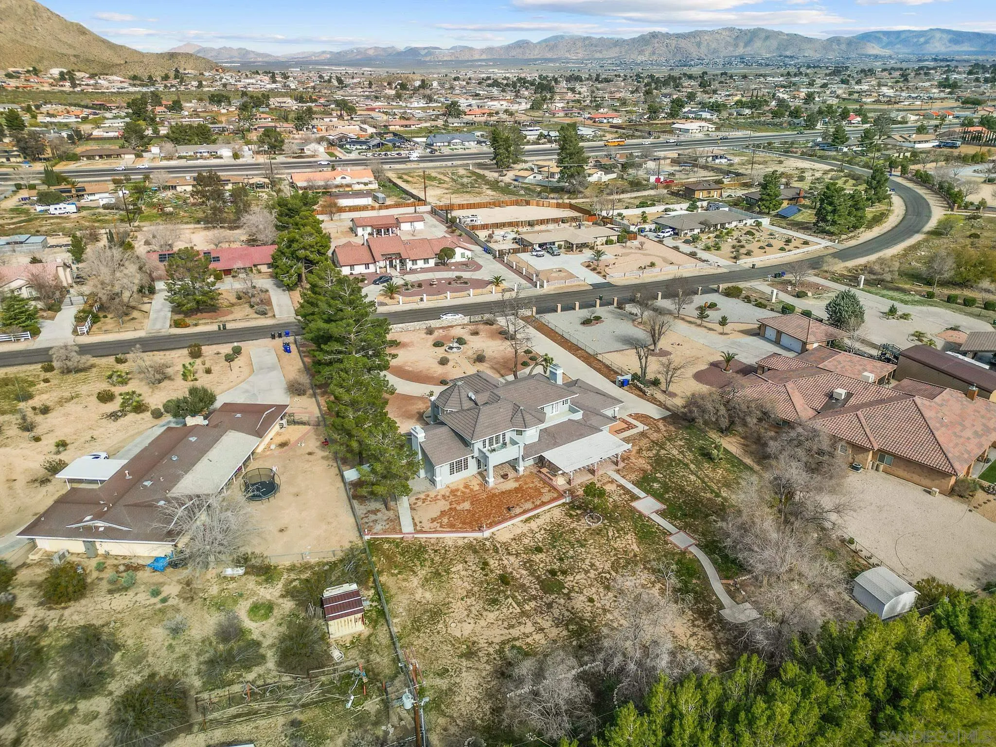 19775 Symeron Road Apple Valley, CA 92307 - Photo 67 of 73 an aerial view of residential houses with outdoor space