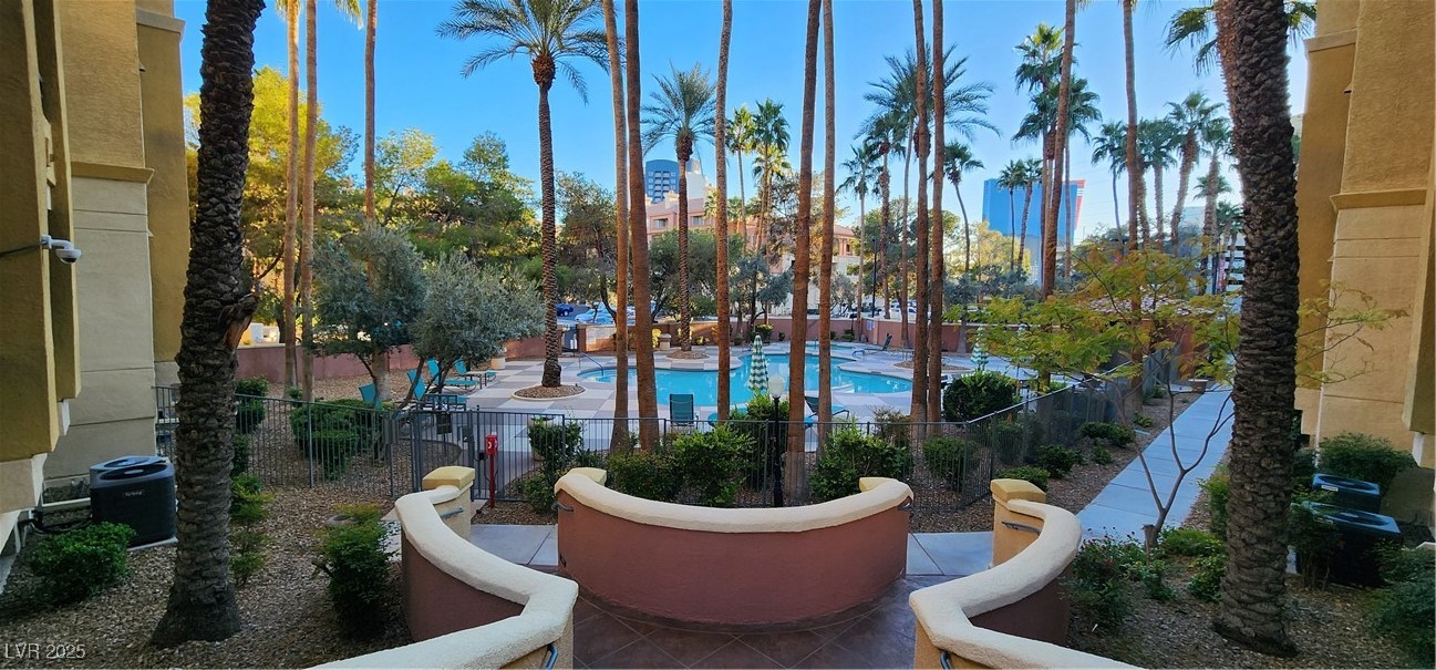210 East Flamingo Road, Unit 326 Las Vegas, NV 89169 - Photo 28 of 58 View from stairs leading to subject unit showing adjacent pool.