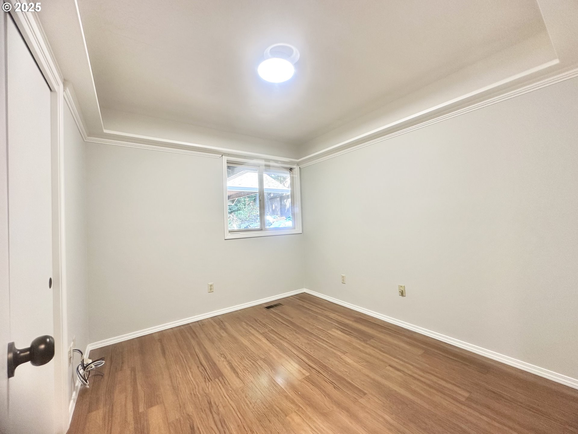 20698 South Mattoon Road Estacada, OR 97023 - Photo 19 of 41 an empty room with wooden floor and windows