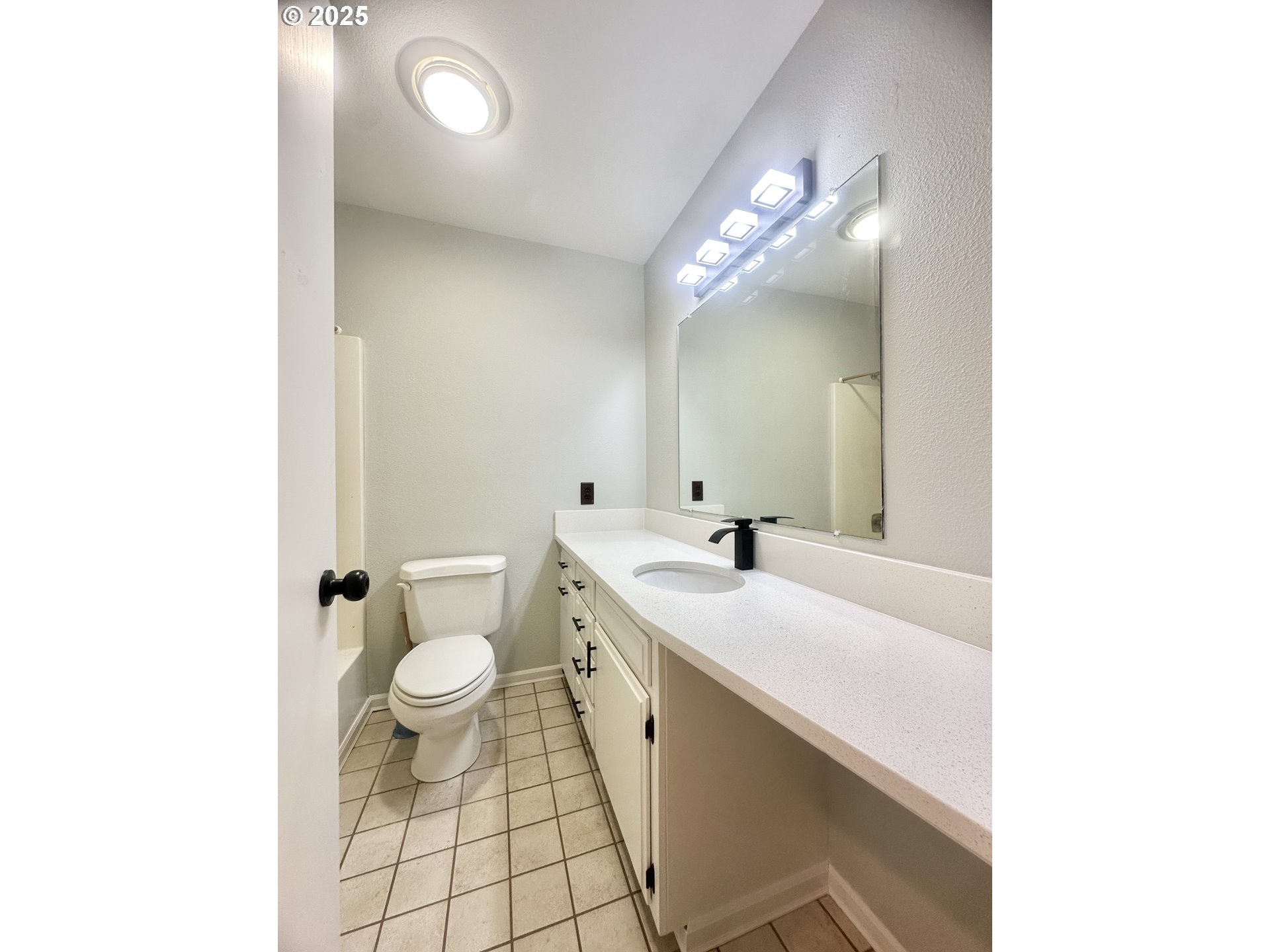 20698 South Mattoon Road Estacada, OR 97023 - Photo 20 of 41 a spacious bathroom with a double vanity sink toilet and a mirror