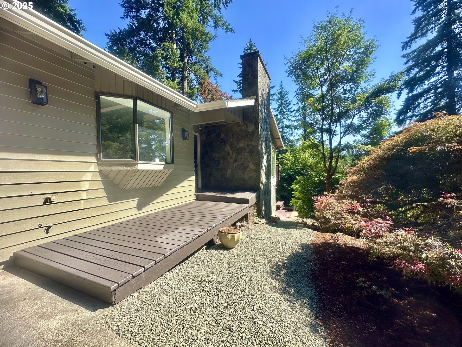 20698 South Mattoon Road Estacada, OR 97023 - Photo 2 of 41 a view of a roof deck with wooden floor and fence