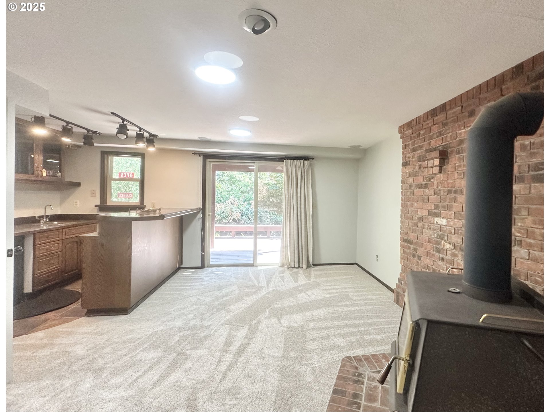 20698 South Mattoon Road Estacada, OR 97023 - Photo 24 of 41 a view of a kitchen with a sink and a large window