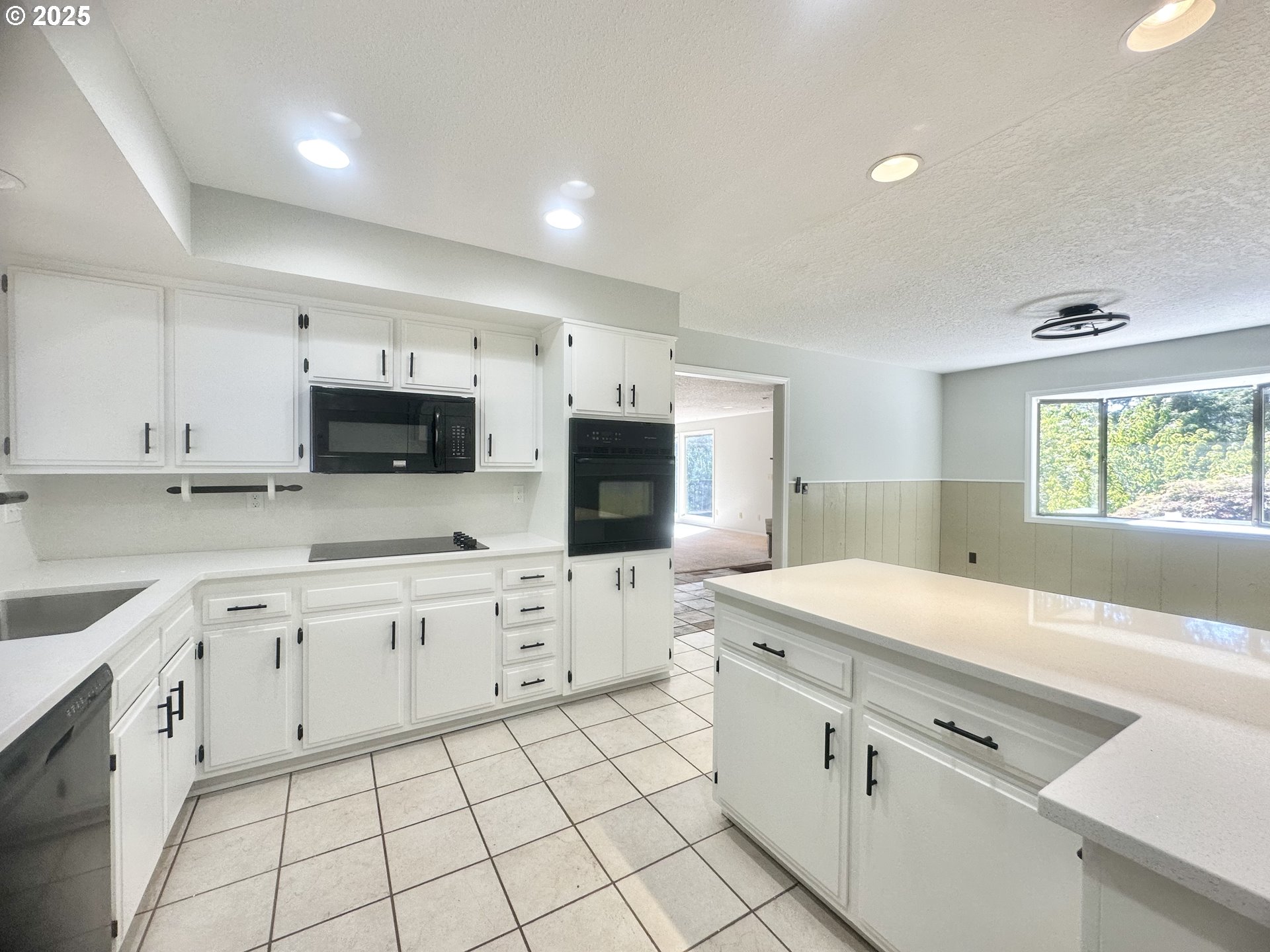 20698 South Mattoon Road Estacada, OR 97023 - Photo 8 of 41 a kitchen with white cabinets appliances and sink