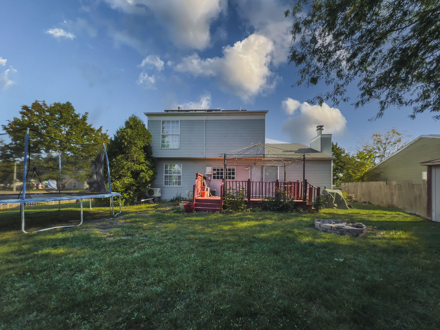800 Indian Wells Circle Elgin, IL 60123 - Photo 15 of 17 a view of a house with a yard and sitting area