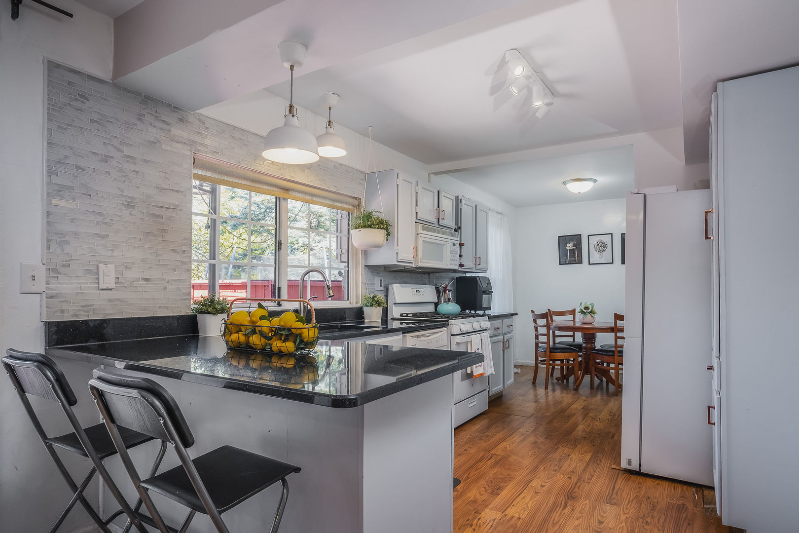 800 Indian Wells Circle Elgin, IL 60123 - Photo 6 of 17 a view of a dining room with furniture window and wooden floor