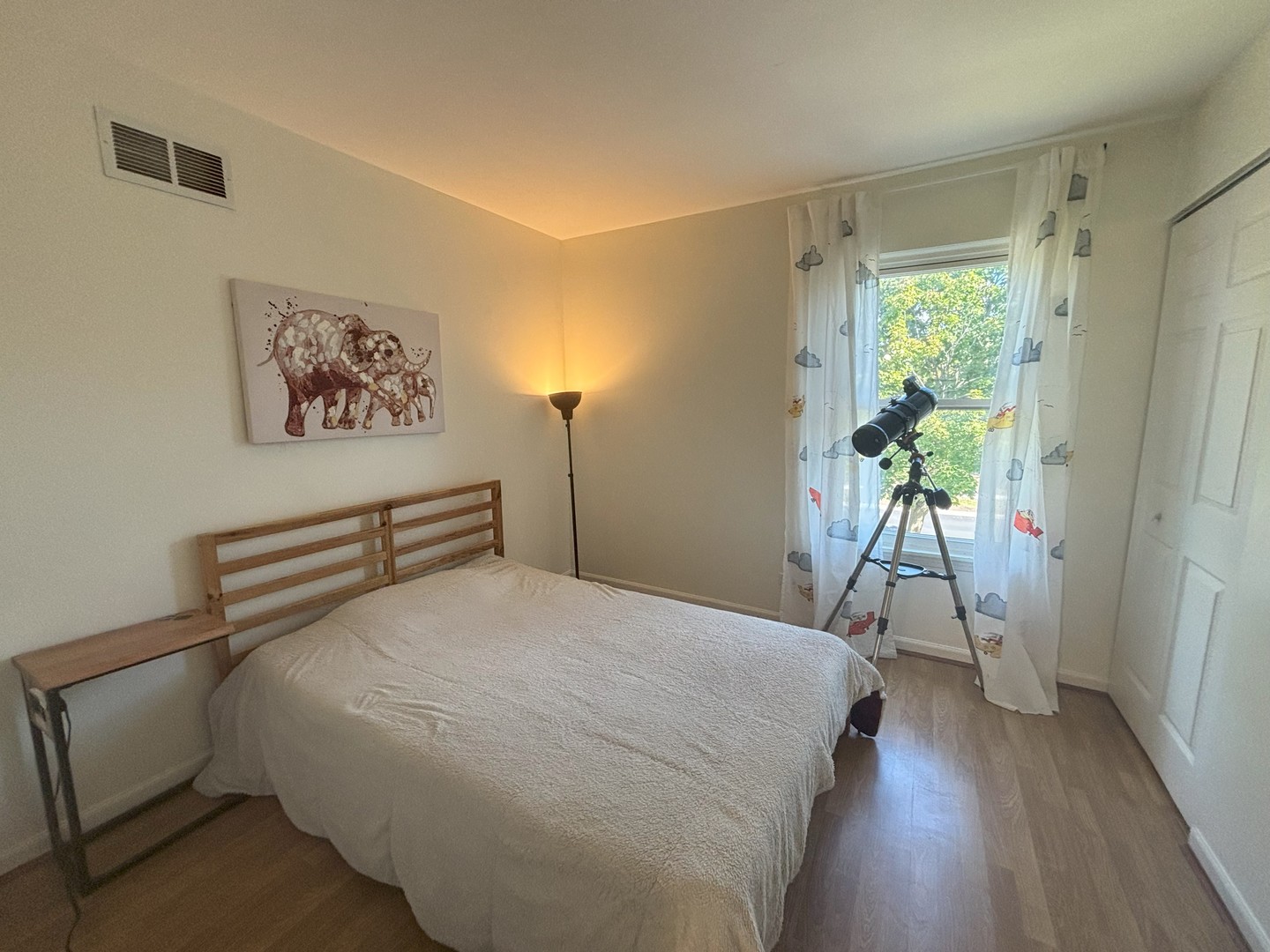 800 Indian Wells Circle Elgin, IL 60123 - Photo 9 of 17 a bedroom with a bed and a painting on the wall