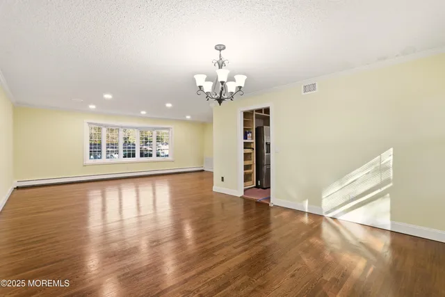 a kitchen with stainless steel appliances a stove sink and cabinets