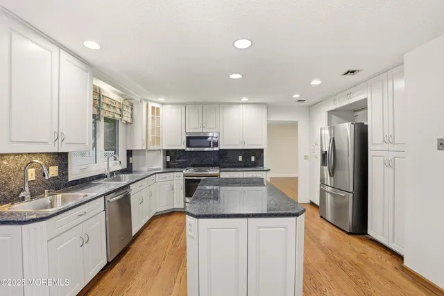 a view of a hallway with a window