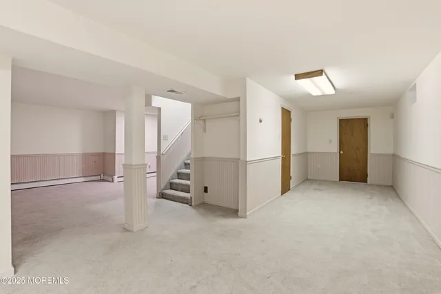 a bathroom with a toilet and a sink