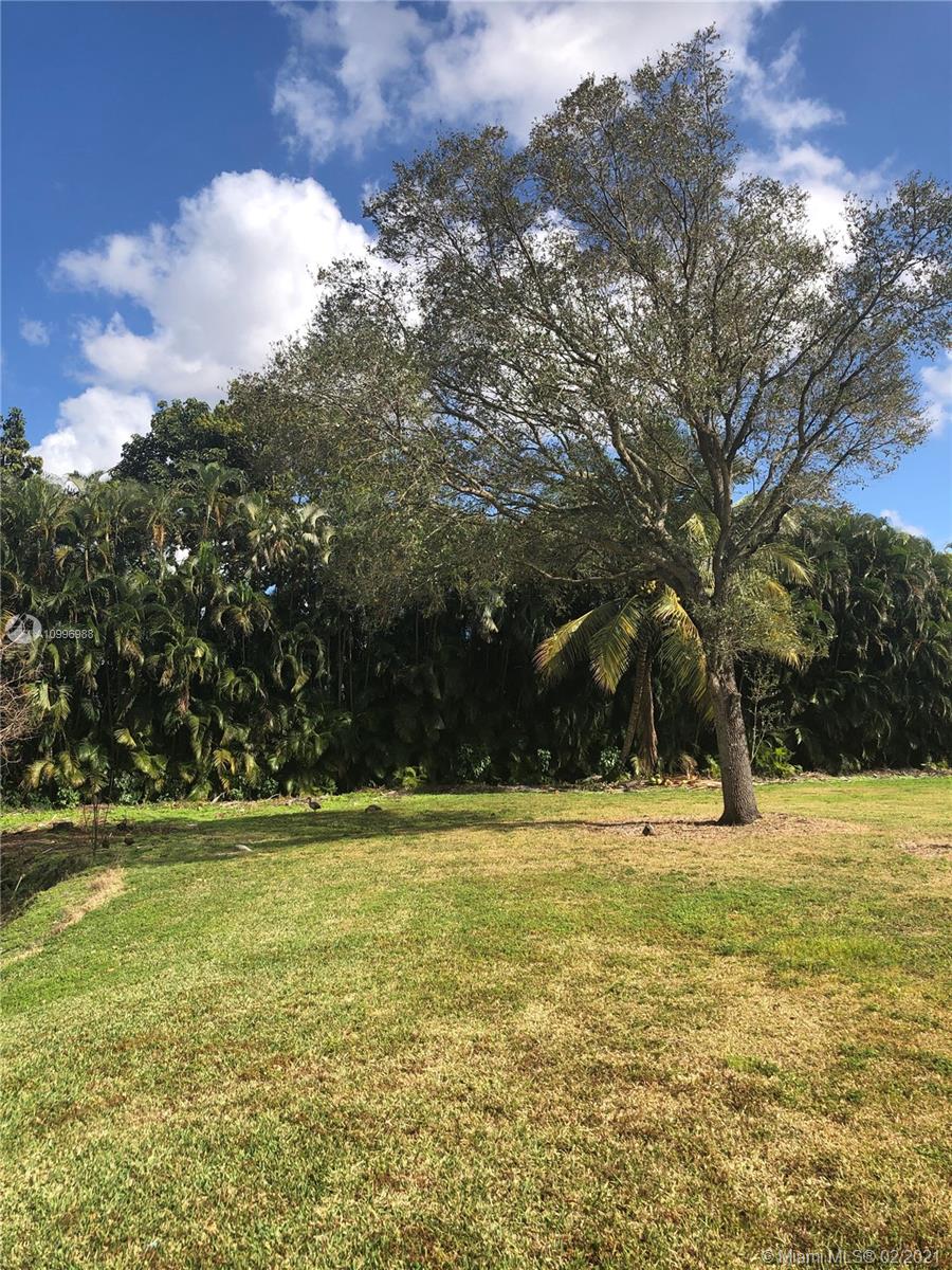 13240 Stirling Road Southwest Ranches, FL 33330 - Photo 13 of 13 a view of a yard with a house