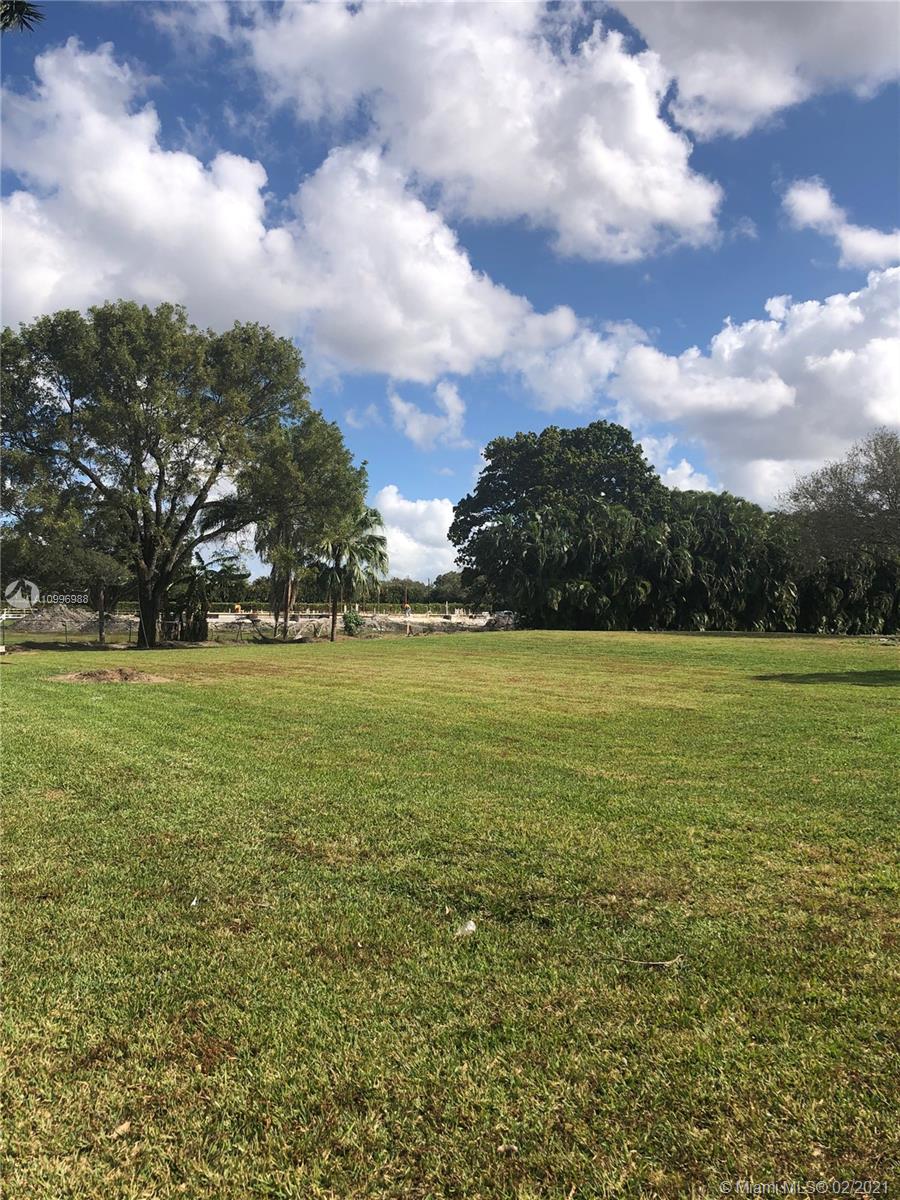 13240 Stirling Road Southwest Ranches, FL 33330 - Photo 3 of 13 a view of a green field