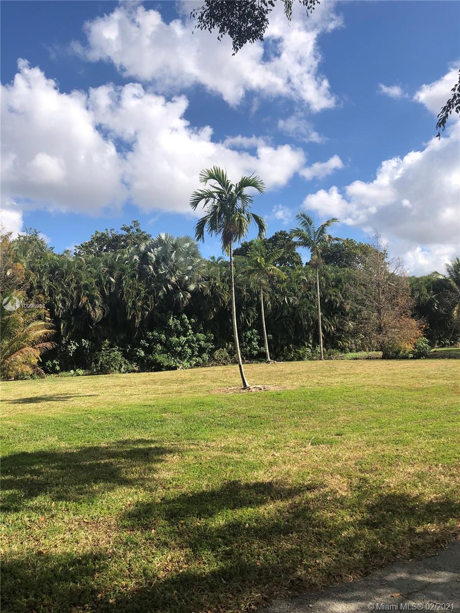 13240 Stirling Road Southwest Ranches, FL 33330 - Photo 9 of 13 a view of a big yard with lots of swings and slides