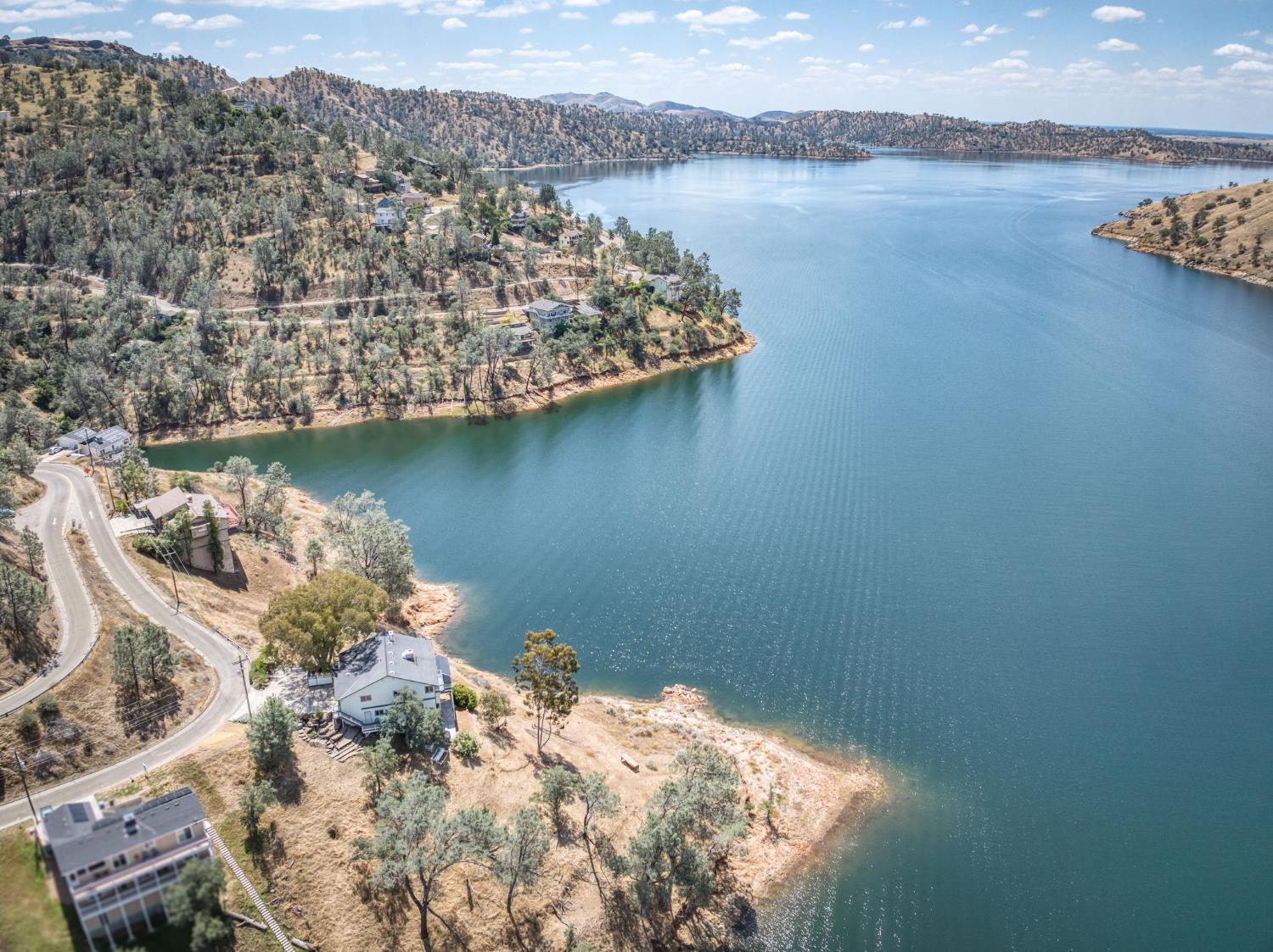28037 Sky Harbour Road Friant, CA 93626 - Photo 37 of 40 a view of a lake with a mountain