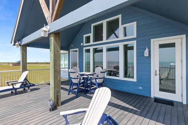 a view of a hall with wooden floor