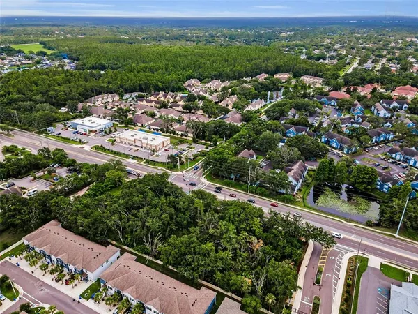 an aerial view of a city with lots of residential buildings