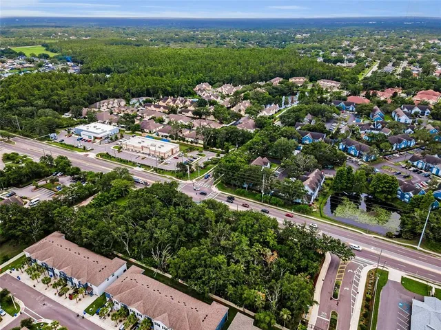 an aerial view of a city with lots of residential buildings