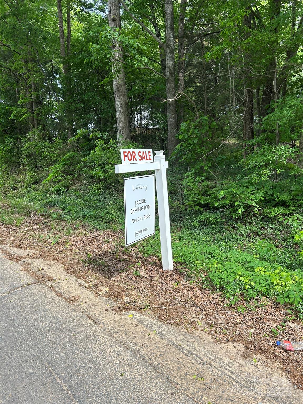 3324 Presson Road Monroe, NC 28112 - Photo 3 of 3 a sign that is sitting in the middle of a field