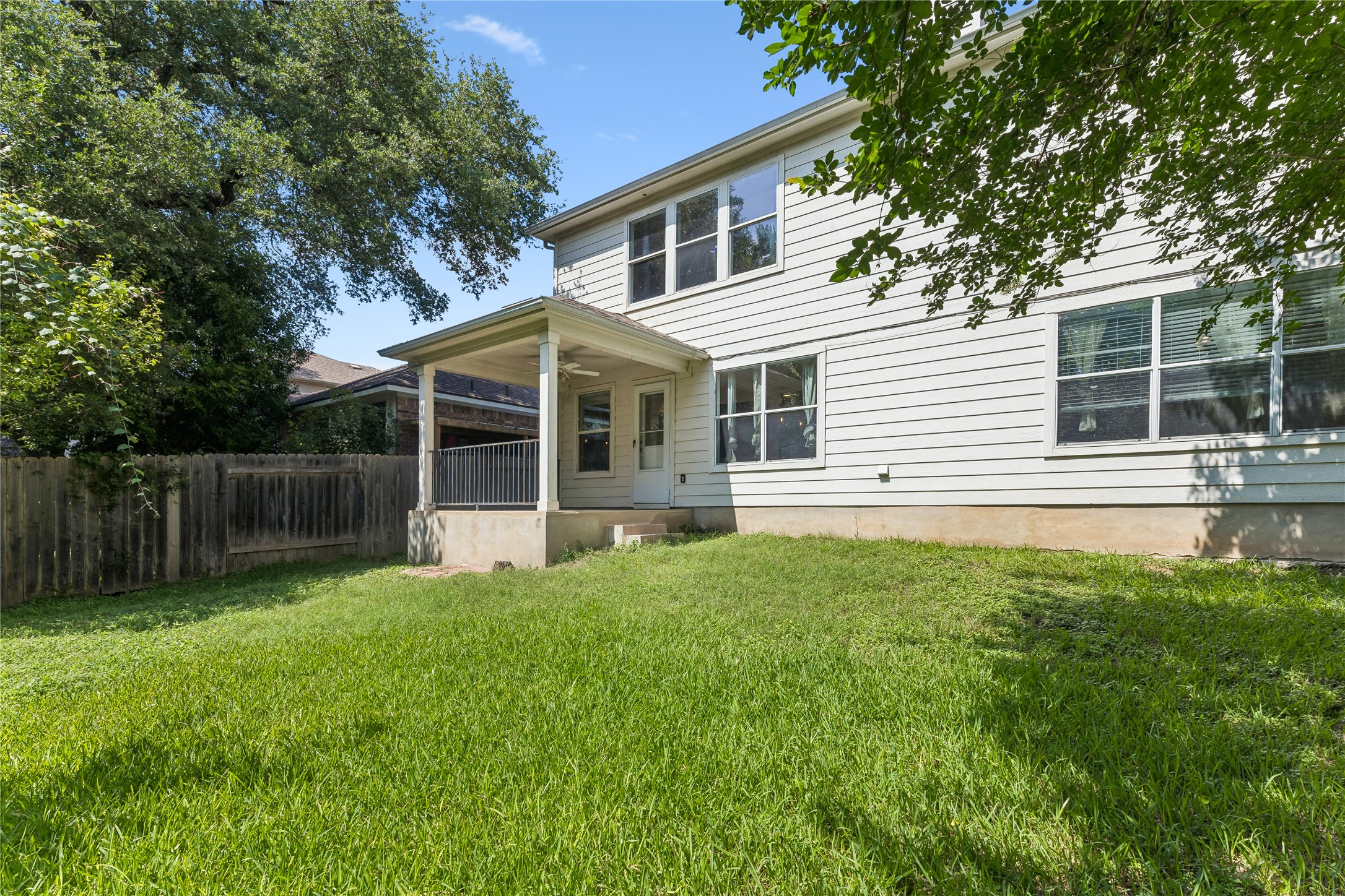 2372 Paradise Ridge Drive Round Rock, TX 78665 - Photo 39 of 40 A verdant backyard with a covered patio provides a private outdoor retreat.