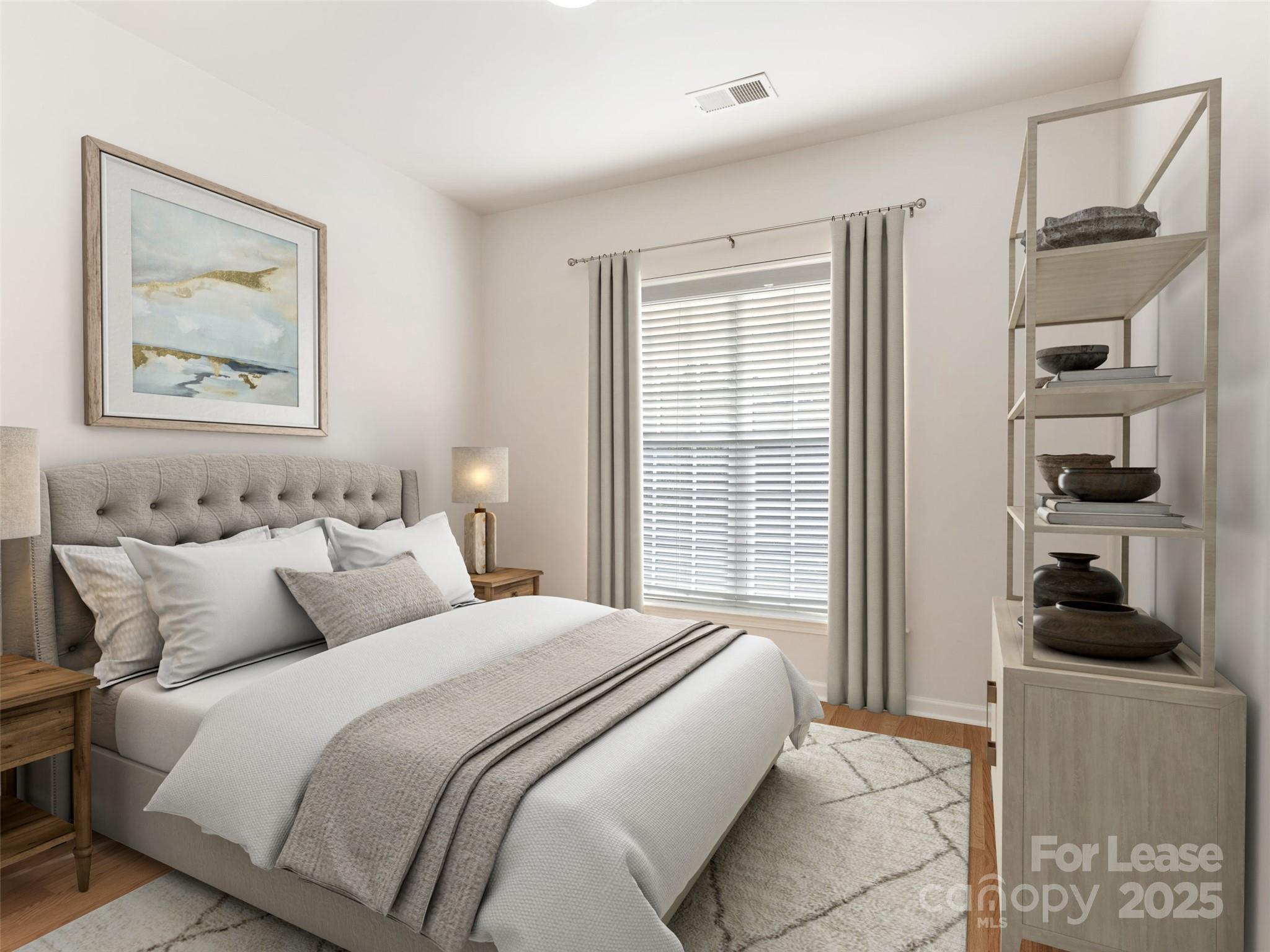 3164 Margellina Drive Charlotte, NC 28210 - Photo 17 of 26 a bedroom with a bed and wooden floor