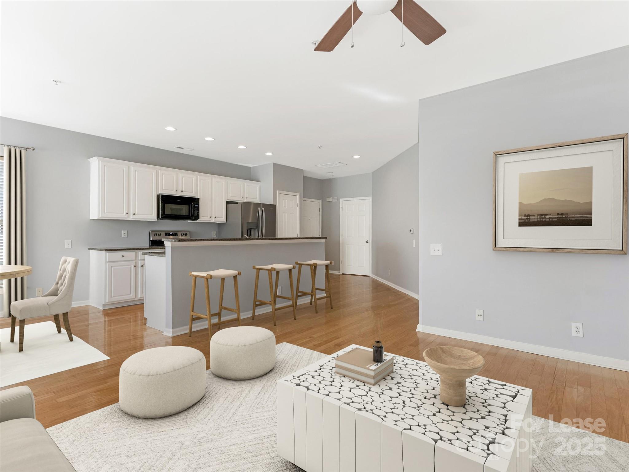 3164 Margellina Drive Charlotte, NC 28210 - Photo 6 of 26 a living room with furniture and kitchen view