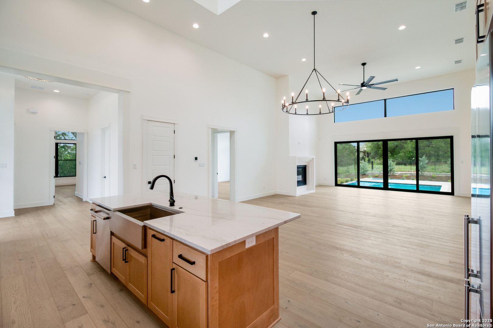 430 Arthur Court Spring Branch, TX 78070 - Photo 17 of 39 a kitchen that has a lot of windows and white walls