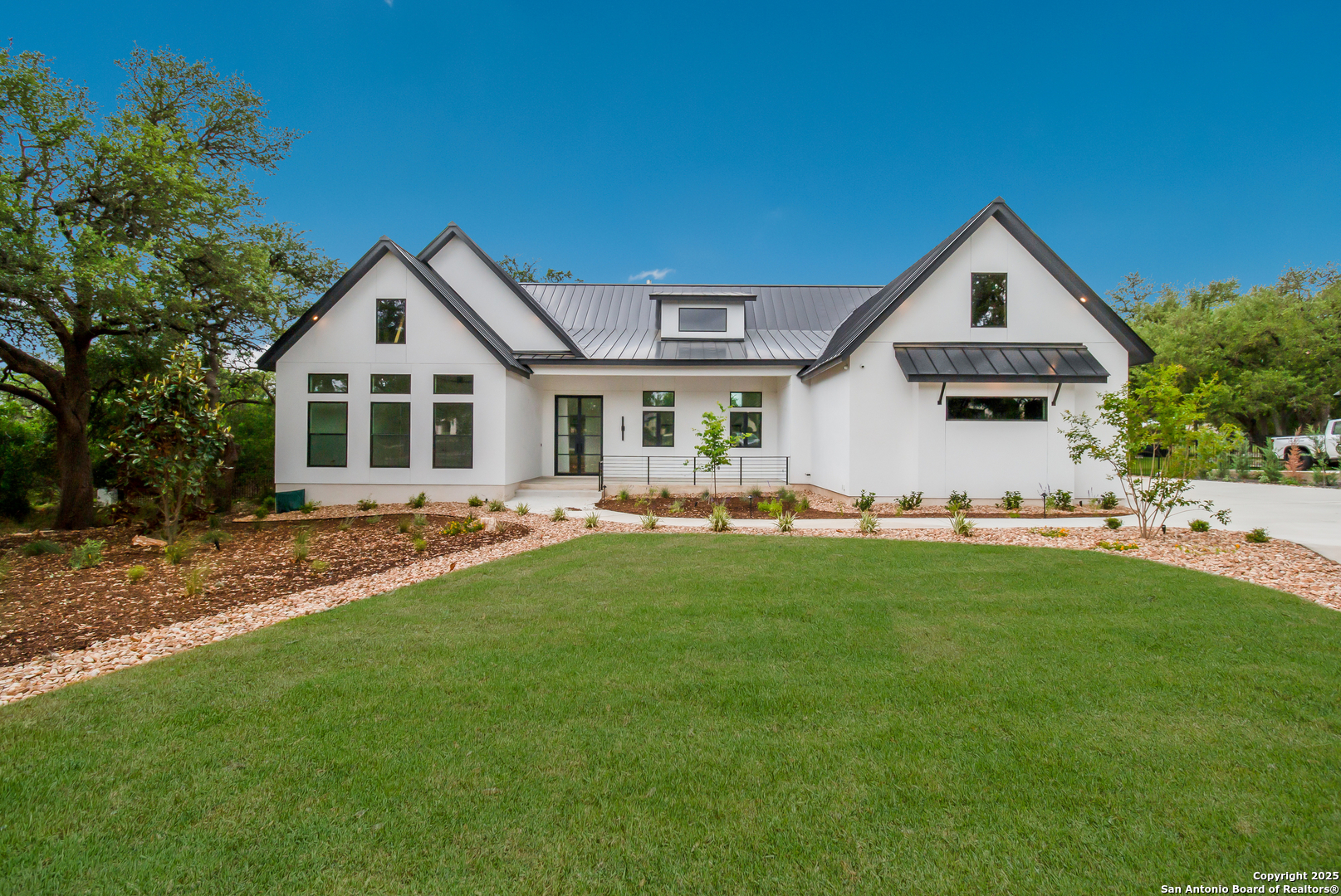 430 Arthur Court Spring Branch, TX 78070 - Photo 2 of 39 a front view of house with yard and green space