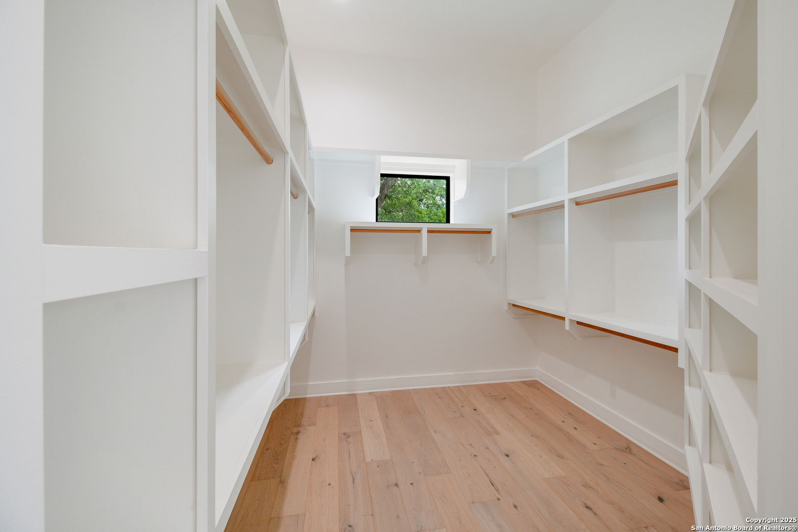 430 Arthur Court Spring Branch, TX 78070 - Photo 21 of 39 wooden floor in an empty room with a window