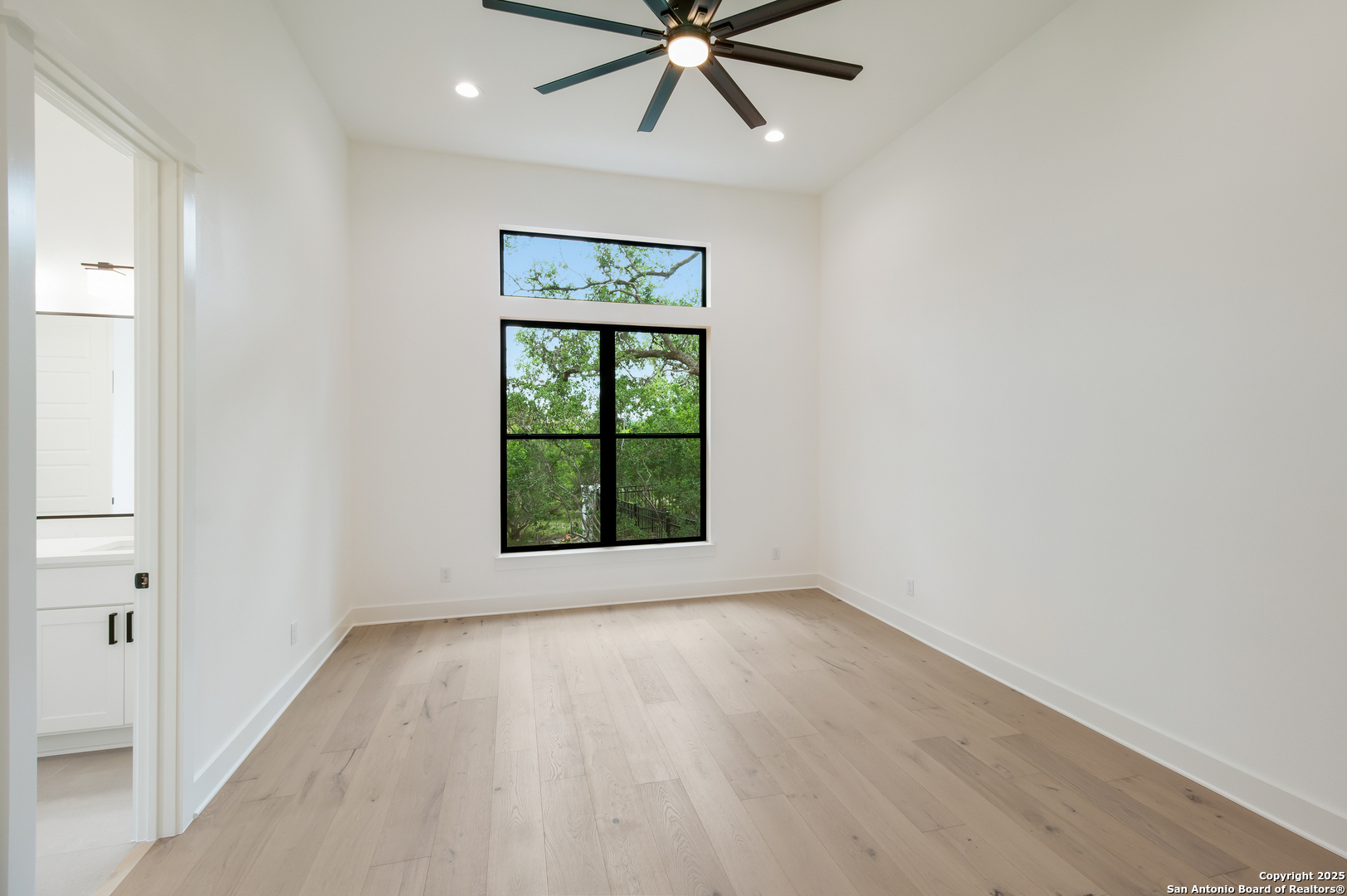 430 Arthur Court Spring Branch, TX 78070 - Photo 25 of 39 an empty room with a window and a ceiling fan