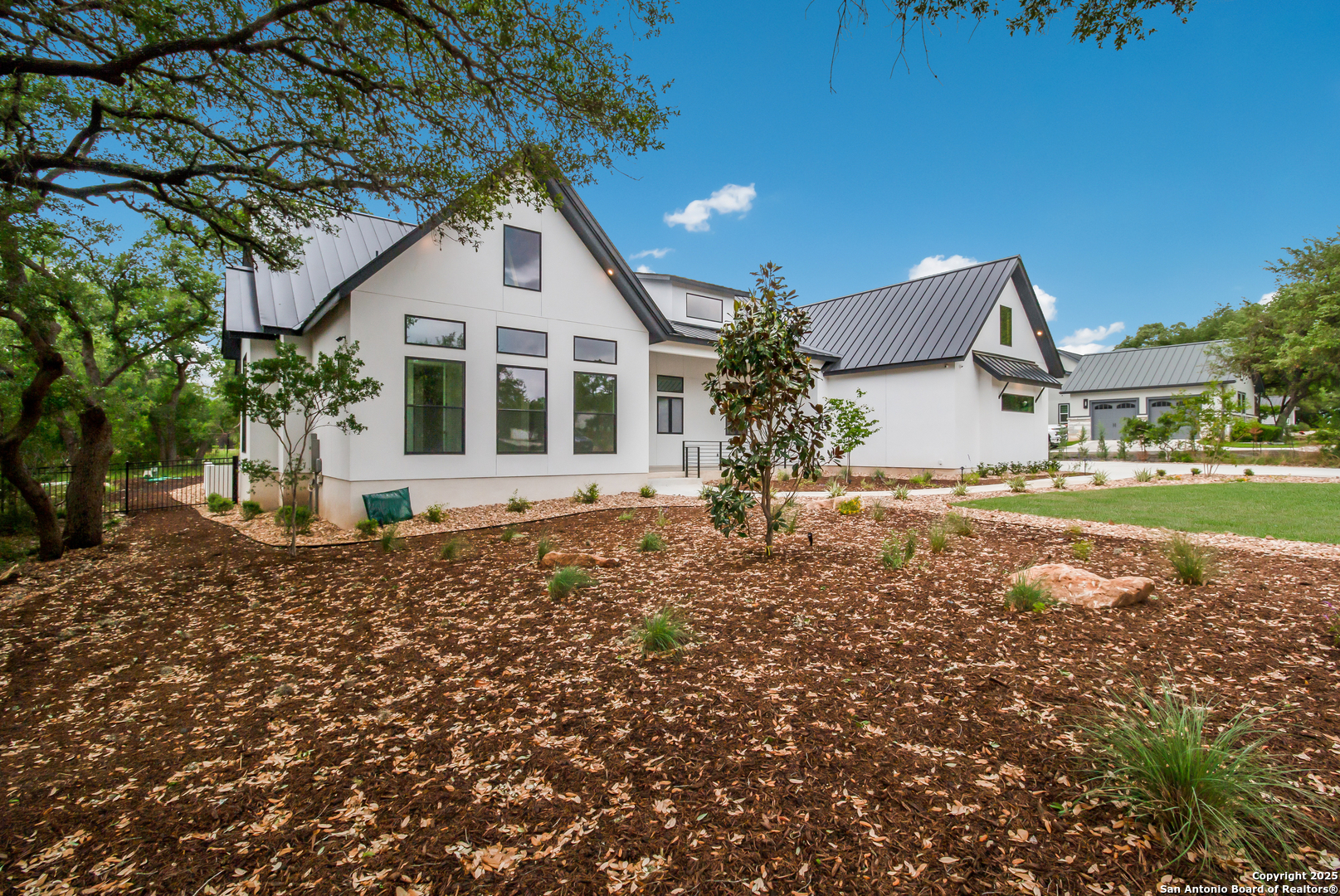 430 Arthur Court Spring Branch, TX 78070 - Photo 3 of 39 a front view of a house with a yard