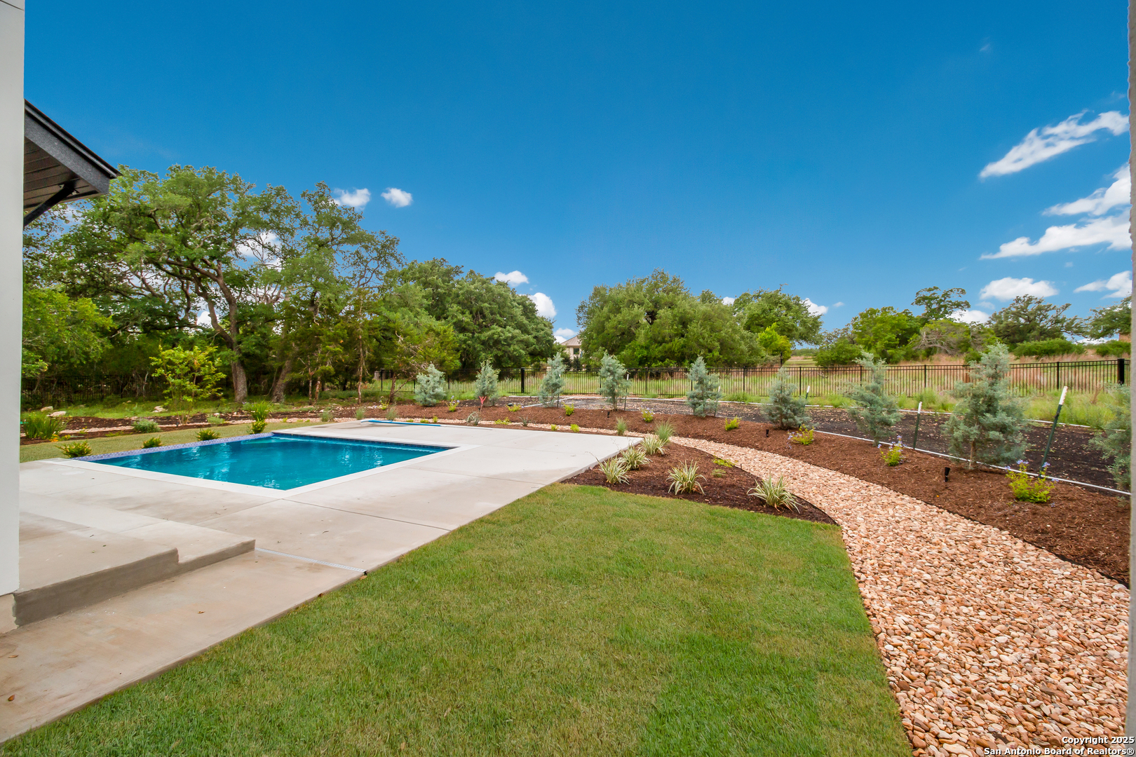 430 Arthur Court Spring Branch, TX 78070 - Photo 32 of 39 a view of a swimming pool with a yard