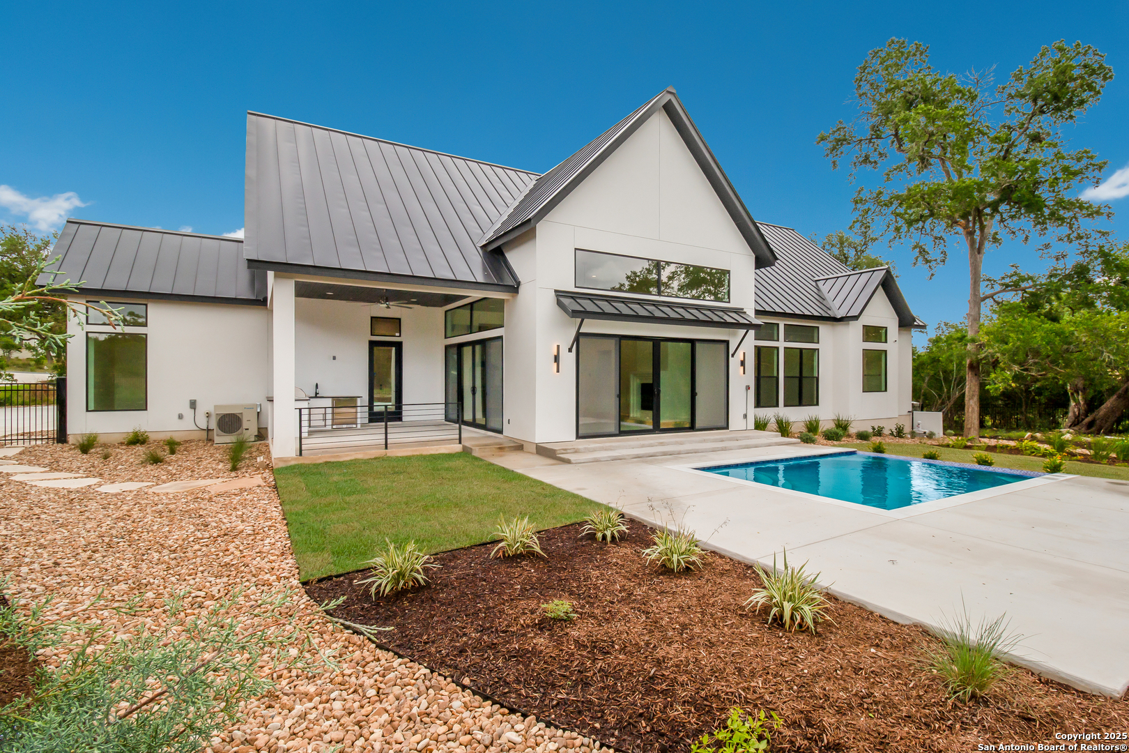 430 Arthur Court Spring Branch, TX 78070 - Photo 35 of 39 a view of a house with a patio and a yard