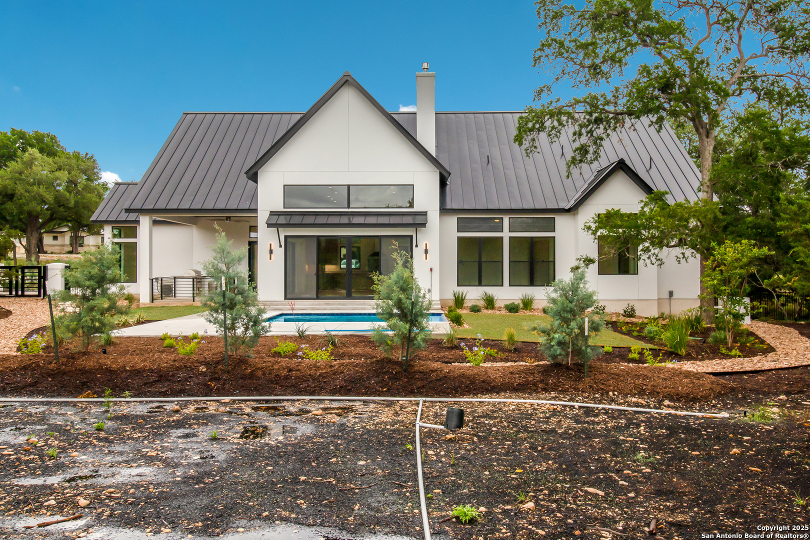 430 Arthur Court Spring Branch, TX 78070 - Photo 38 of 39 a front view of a house with garden