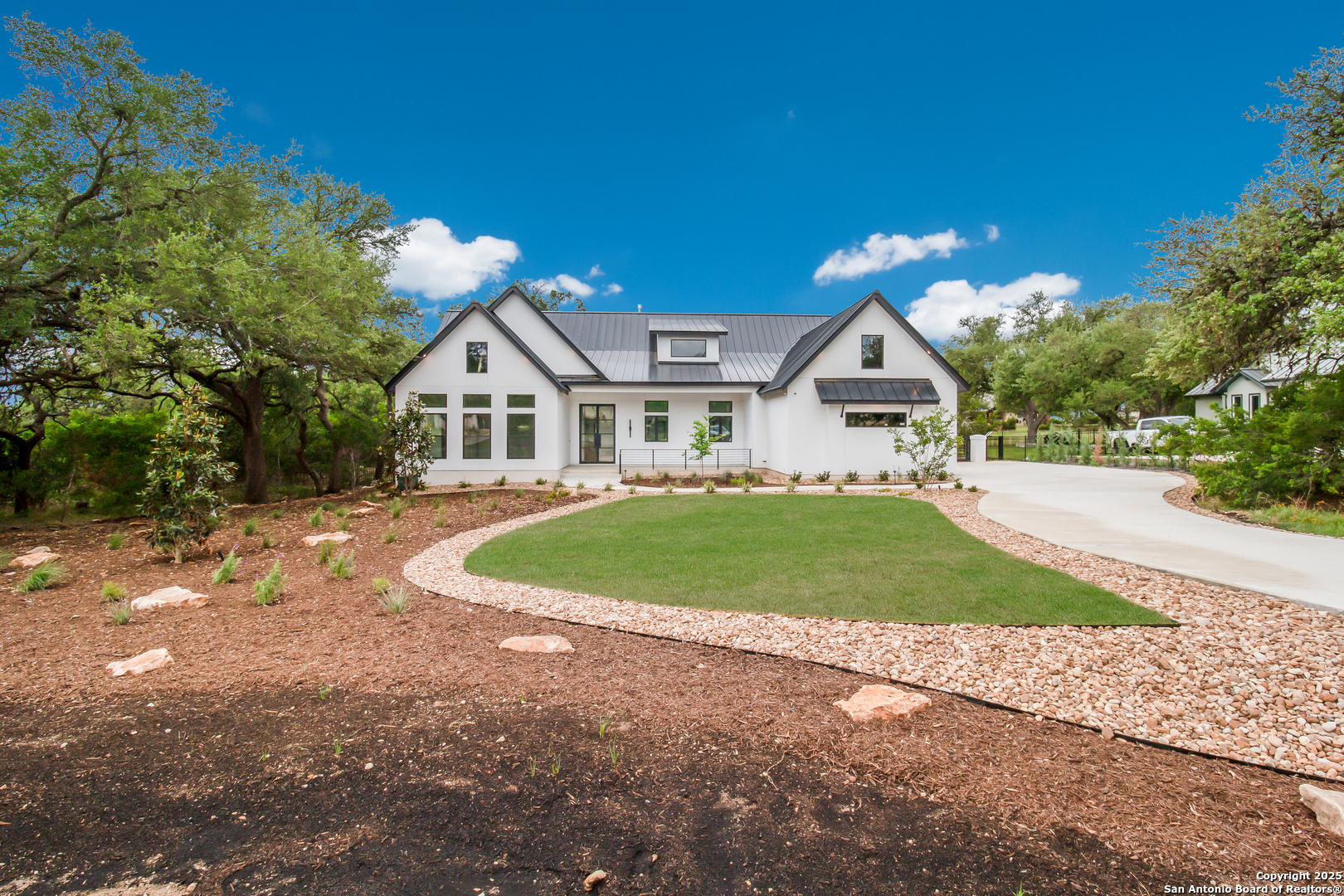 430 Arthur Court Spring Branch, TX 78070 - Photo 6 of 39 a front view of a house with a yard