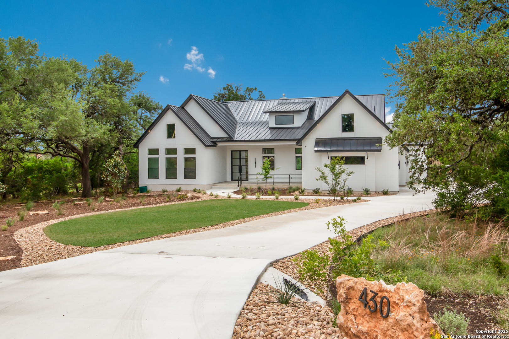 430 Arthur Court Spring Branch, TX 78070 - Photo 9 of 39 a front view of a house with a yard