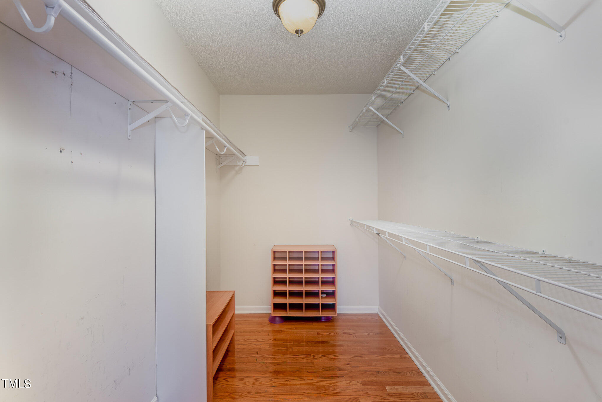 5 Coach Terrace Durham, NC 27713 - Photo 16 of 36 a view of room with cabinets and entryway