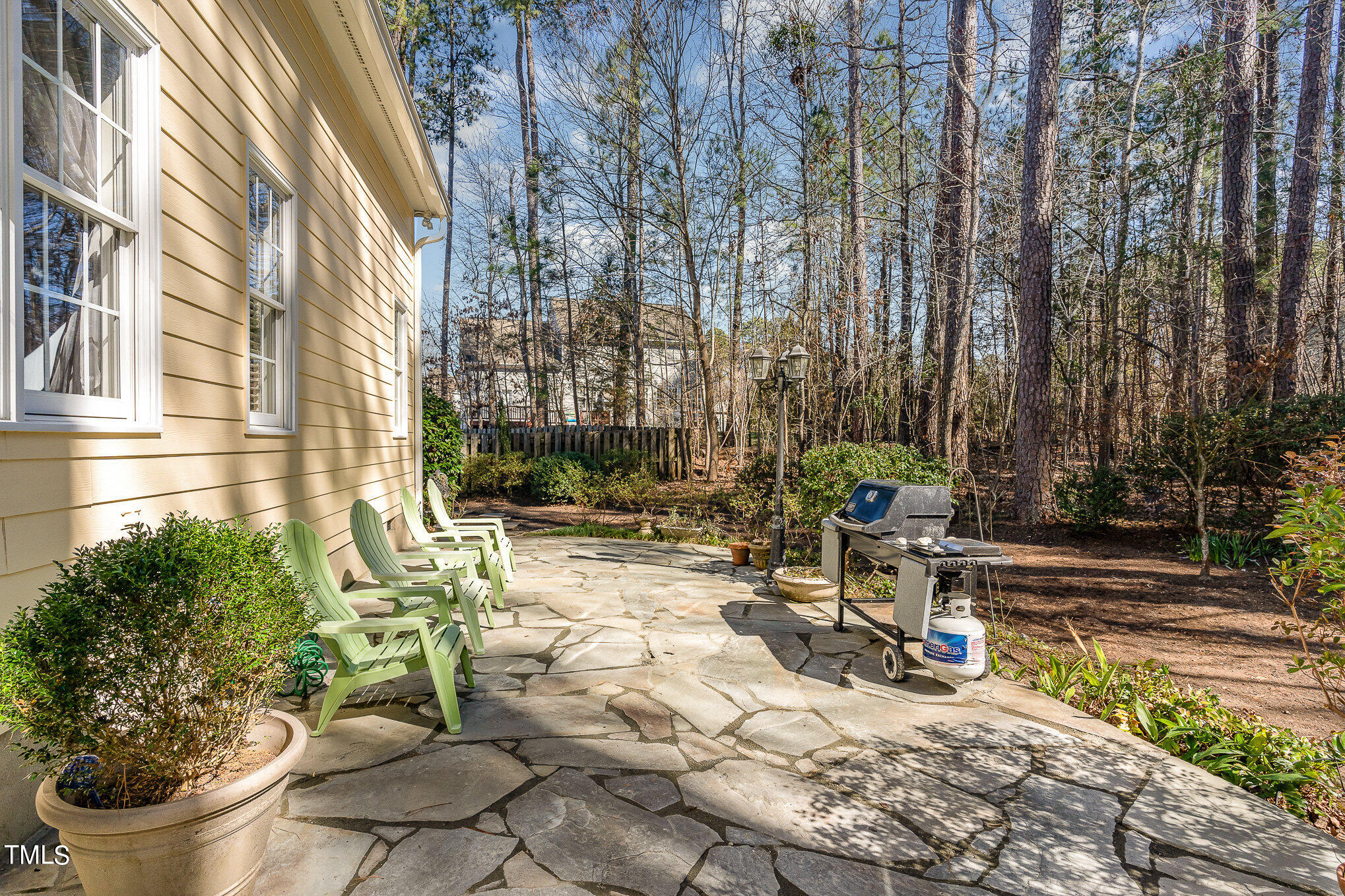 5 Coach Terrace Durham, NC 27713 - Photo 29 of 36 a view of a patio with chairs and potted plants
