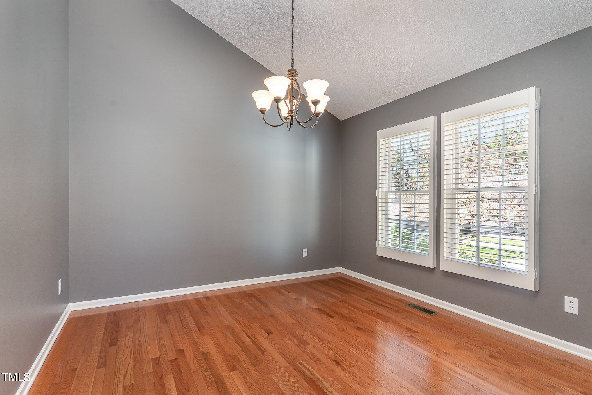 5 Coach Terrace Durham, NC 27713 - Photo 6 of 36 a view of a room with wooden floor and a window