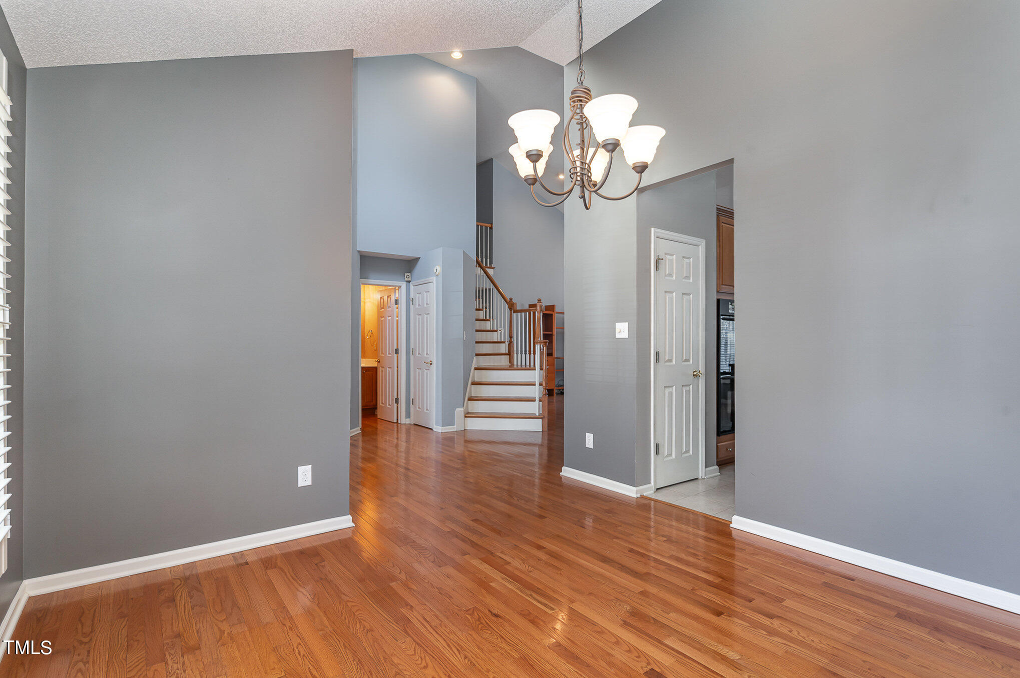 5 Coach Terrace Durham, NC 27713 - Photo 7 of 36 wooden floor in an empty room with a mirror