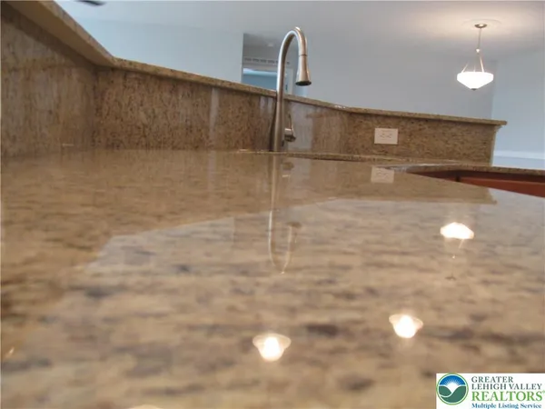 a close view of a sink in the kitchen