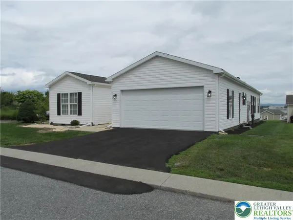 a front view of house with yard