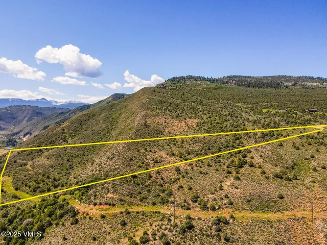 a view of an empty room with mountain