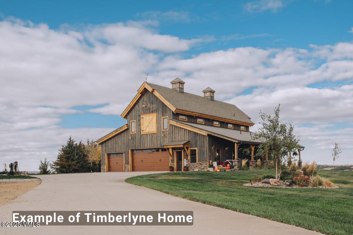 1463 Wolcott Springs Road Wolcott, CO 81655 - Photo 6 of 27 a front view of a house with a garden