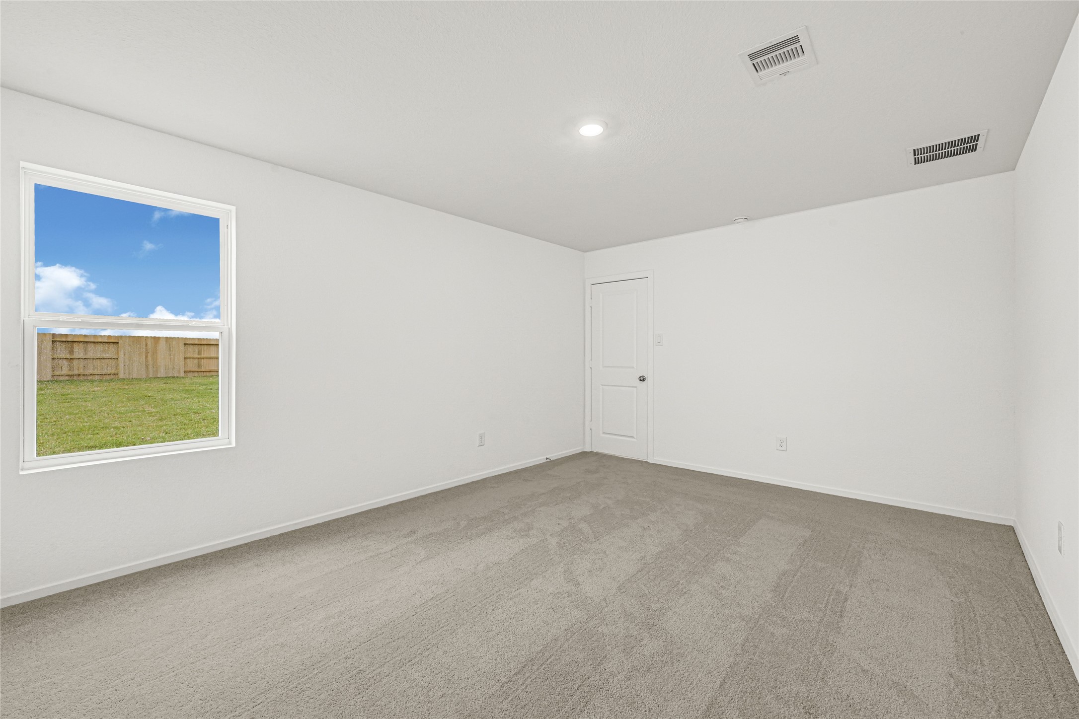 16102 Rustic Prairie Drive Hockley, TX 77447 - Photo 11 of 22 an empty room with a window