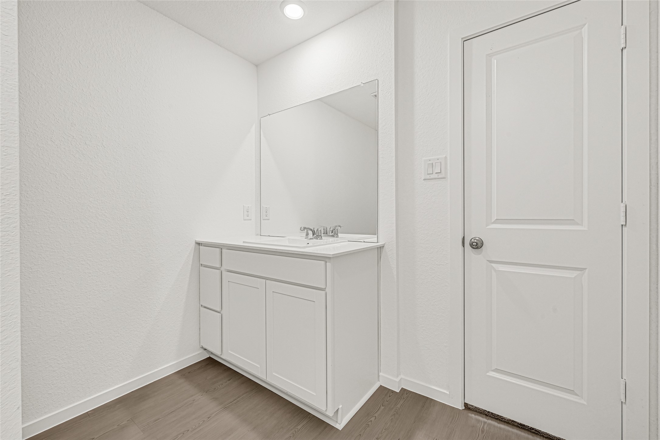 16102 Rustic Prairie Drive Hockley, TX 77447 - Photo 19 of 22 a bathroom with a sink and a mirror