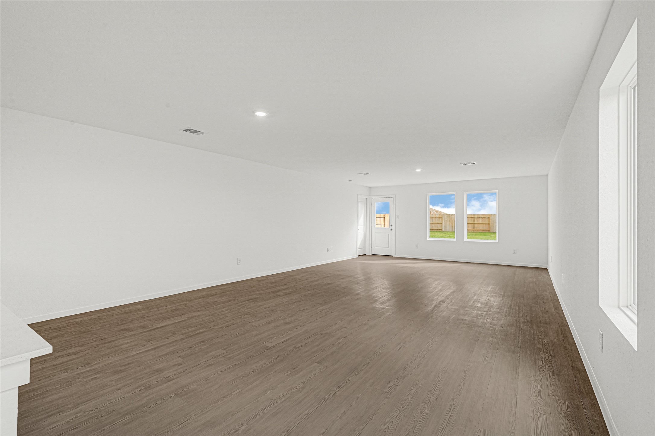 16102 Rustic Prairie Drive Hockley, TX 77447 - Photo 4 of 22 an empty room with a empty space and window