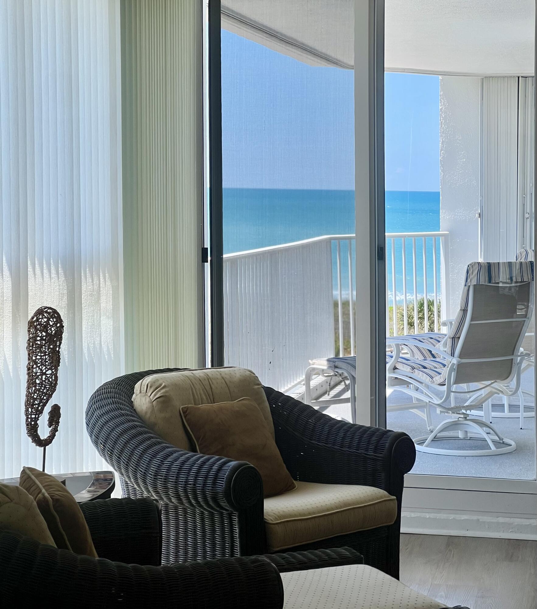 2700 North Hwy A1A, Unit 506 Fort Pierce, FL 34949 - Photo 11 of 28 a living room with furniture and a window