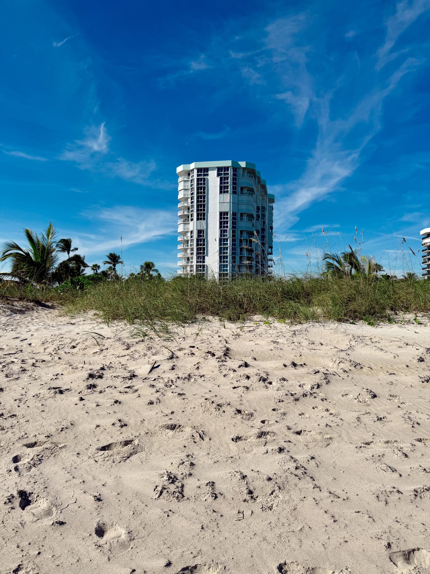 2700 North Hwy A1A, Unit 506 Fort Pierce, FL 34949 - Photo 2 of 28 a view of a dry yard with a house
