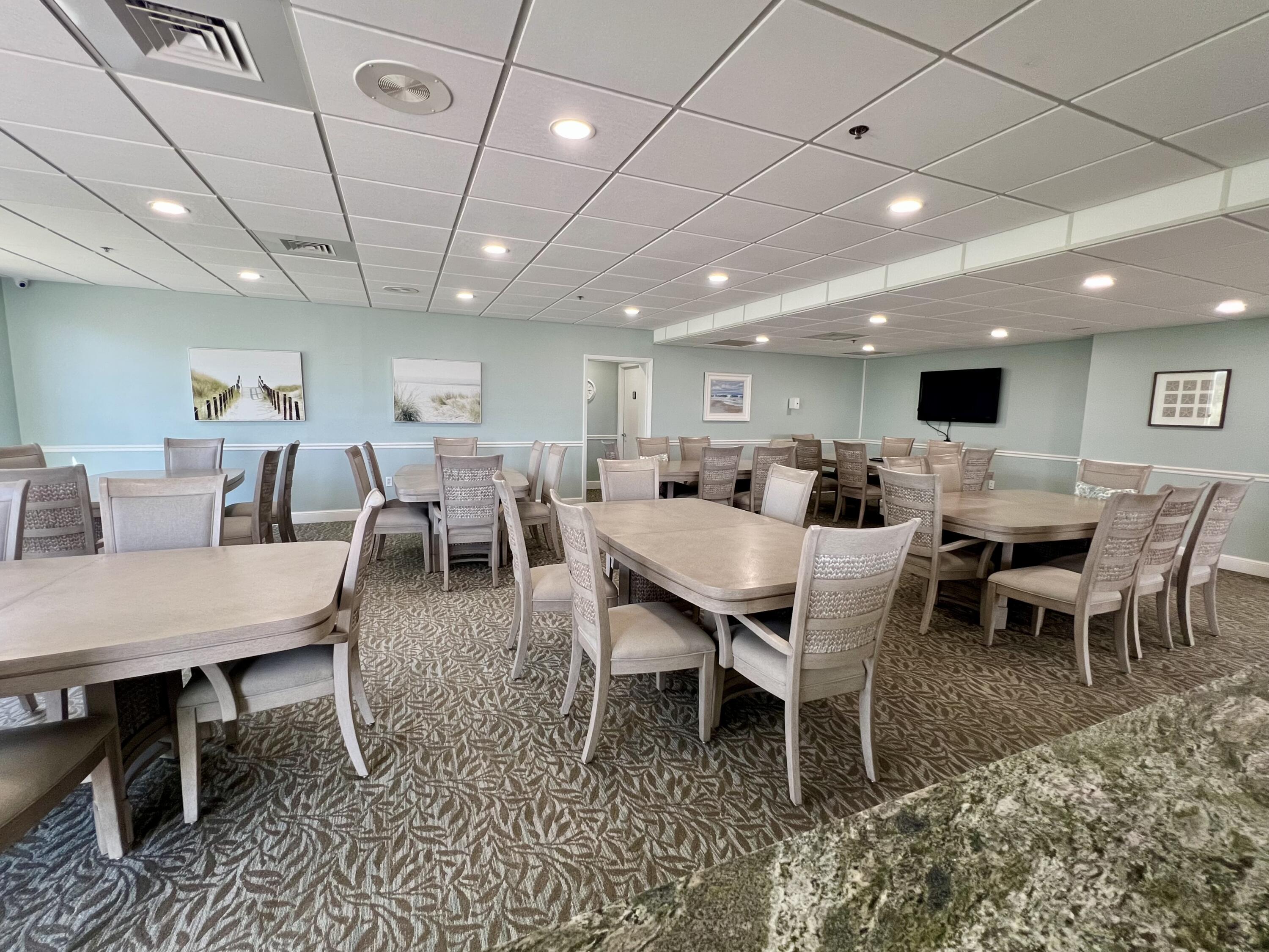 2700 North Hwy A1A, Unit 506 Fort Pierce, FL 34949 - Photo 23 of 28 a view of a dining room with furniture